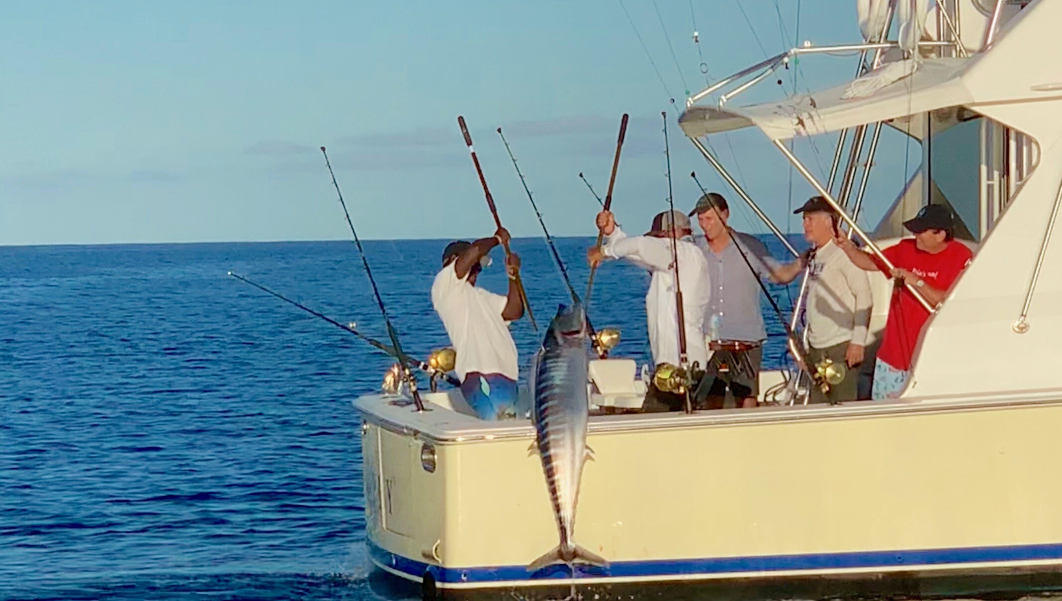Catching a wahoo on a Turks and Caicos boat charter, deep sea fishing with Panoply